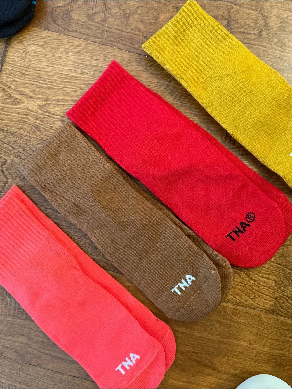 TNA Crew Socks in Red, Brown, Coral, and Mustard